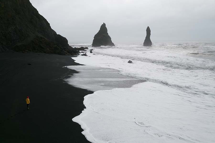 Black beach, strong waves and cliffs in Iceland