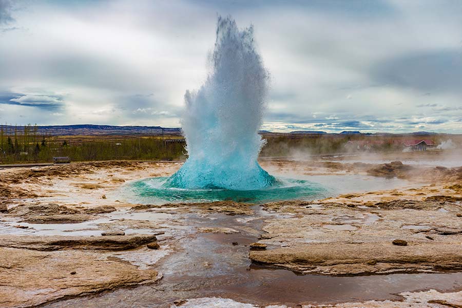 The Great Geysir erupting in spring, Iceland